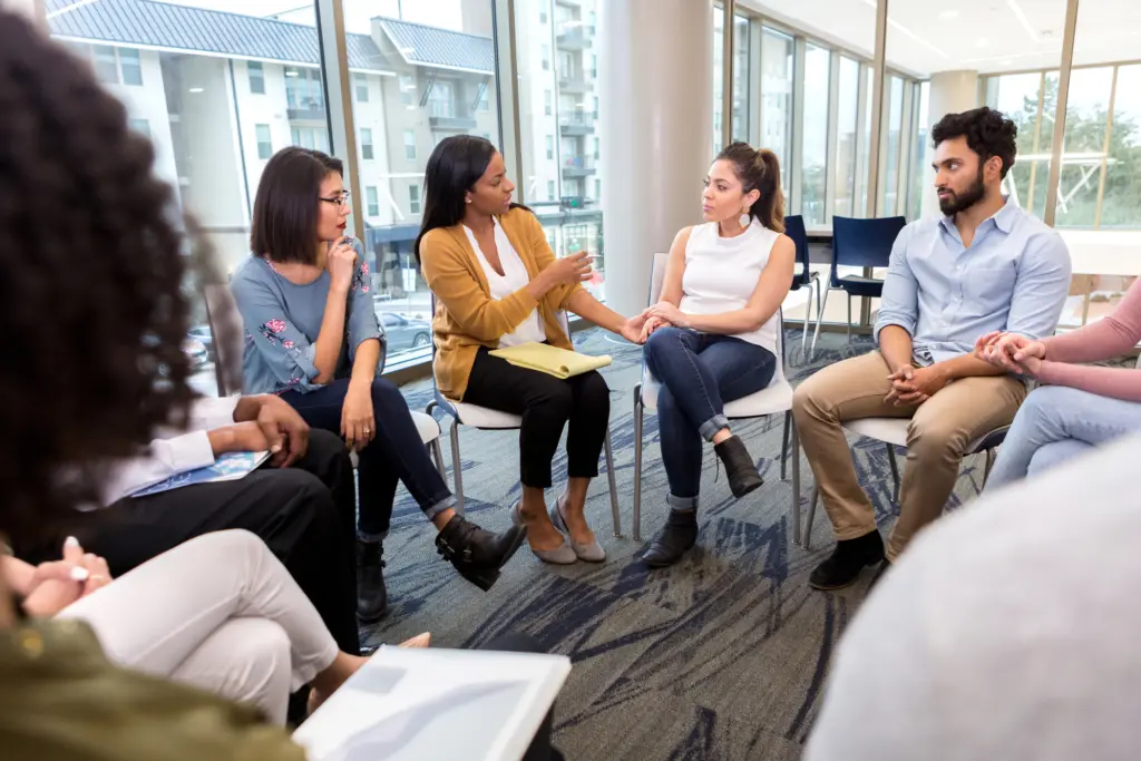 What's the difference between Intensive Outpatient Programs and Partial Hospitalization Programs?
